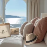 selection of branded hotel items and accessories on bed at a hotel room