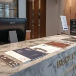 hotel reception desk branding and guest check in area